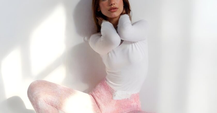 Dua Lipa Embraces Soft Aesthetics in Dreamy Pink & White Look